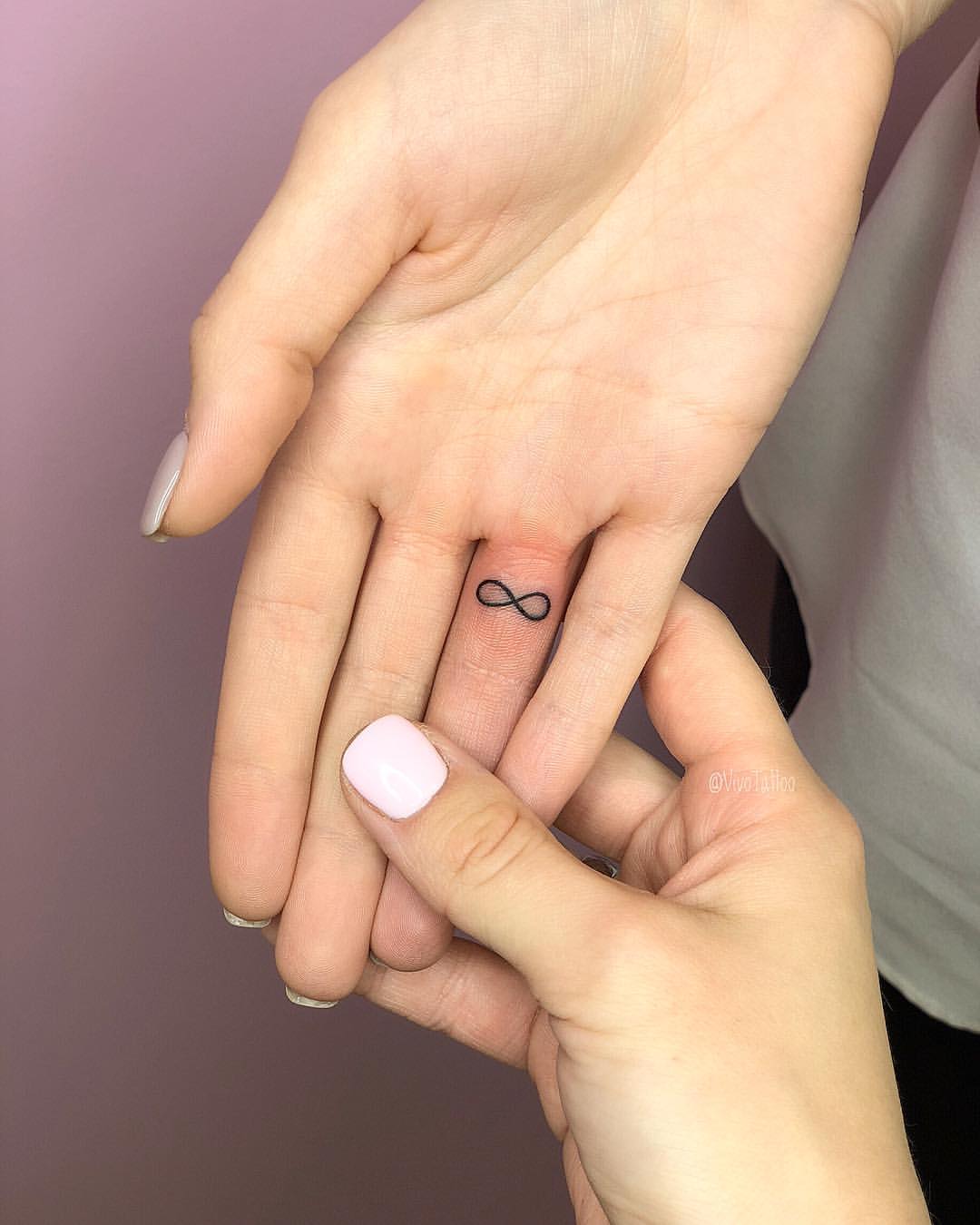 Tiny Infinity Tattoo on the Inner Finger