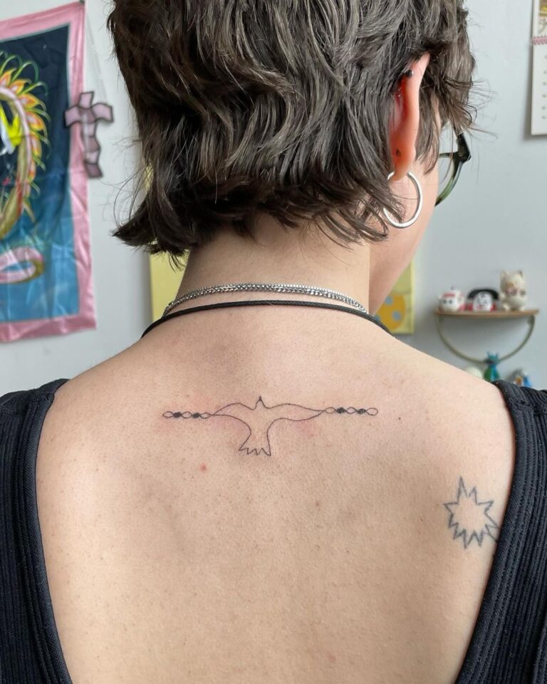 Bird back tattoo