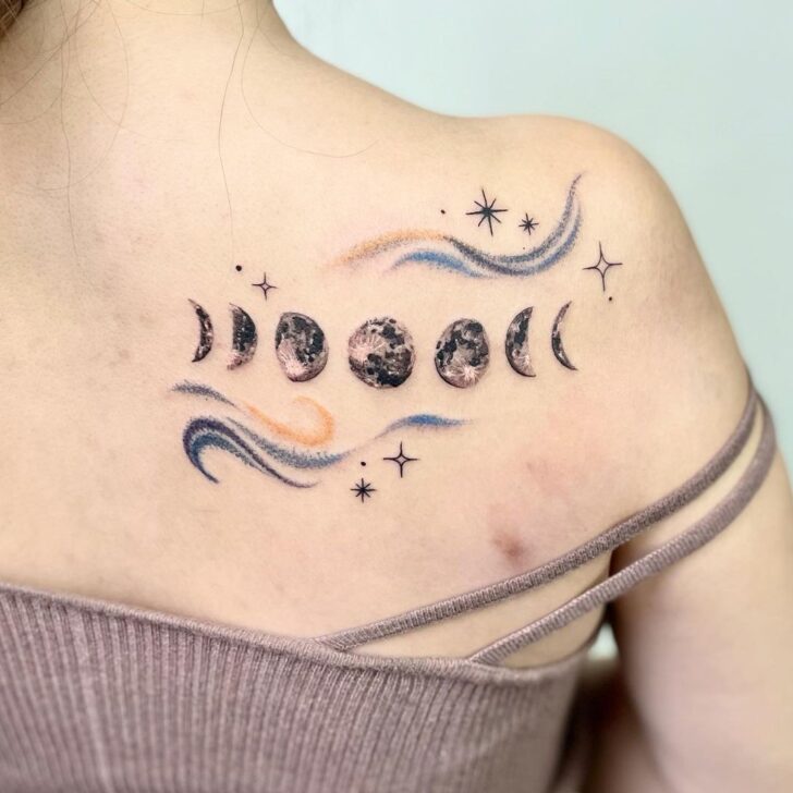 Moon phases back tattoo